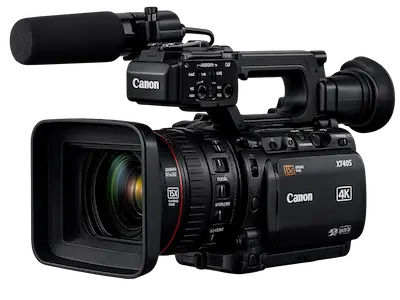 Filmadora profissional Canon 4K com objetiva e microfone externo, representando a manutenção de filmadoras da Digitech BH