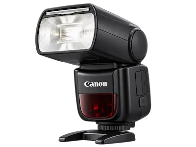 Flash fotográfico Canon com cabeça articulada, representando o serviço de manutenção de flashes da Digitech BH